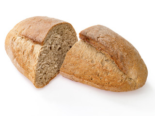 Just baked loaf of rye bread cut in two pieces. On white background
