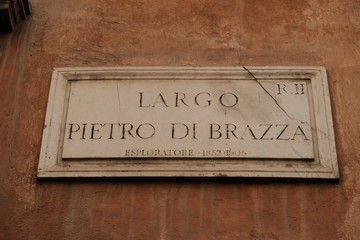 Obraz premium Rome, Italy - August 9, 2017: Largo Pietro Di Brazzà street name sign, located in Trevi district