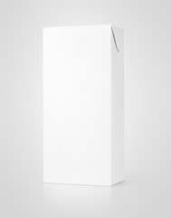Milk or juice carton package on gray background with clipping path
