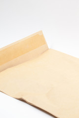 Crinkled brown open envelope