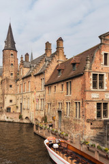 Naklejka premium Tourist boat in Bruges