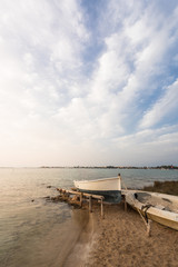 Fototapeta na wymiar Boat moored on the shore of the island of Formentera in Spain