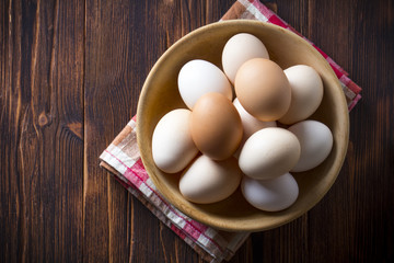Eggs home made wooden plate Background vintage wood
