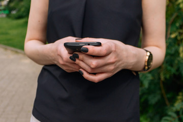 Women hands with smartphone.