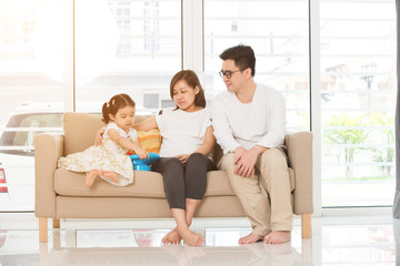 Fototapeta premium asian family on sofa