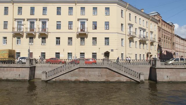 Embankment of Griboedov canal and old-fashioned building in the summer - St. Petersburg, Russia