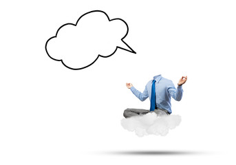 Headless businessman meditating
