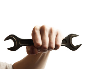 hand hold spanner tool in hand