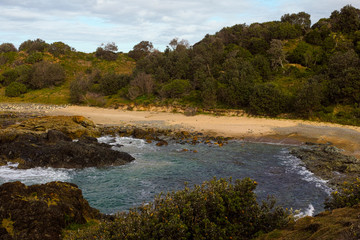 Fototapeta na wymiar Rocky seashore at Little Bay Port Macquarie Australia