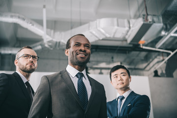 group of modern stylish multiethic businessmen