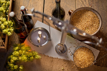 Home Brewing of Beer. Man Weighs Barley. View Above.
