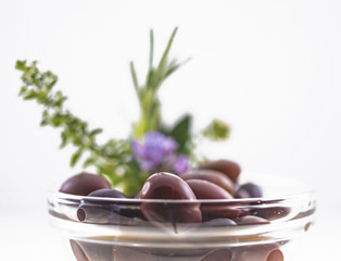 Cup with olives, rosemary, thyme, lavender, bouquett