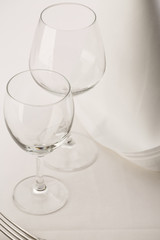 Wineglasses arranged in elegant setting, Selective focus with soft light