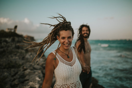 Woman with partner on beach