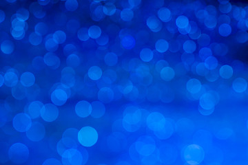 blue glitter texture christmas abstract background. Abstract blue lights on background. bokeh blue background.