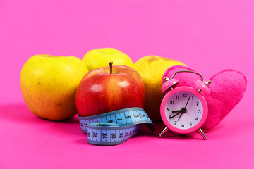 Set of apples in red and yellow colors on tape