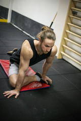 Fototapeta premium Young man working out in the gym.