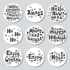 Obraz premium Christmas New Year gift round stickers. Labels xmas set. Hand drawn decorative element. Collection of holiday christmas stickers in black white. Texture. Vector illustration. Lettering, calligraphy.