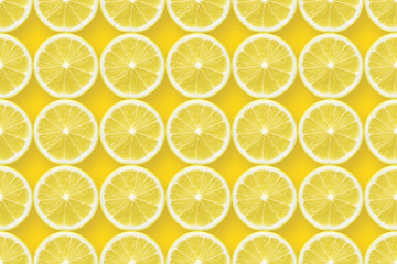 Fototapeta premium lemon slices over yellow
