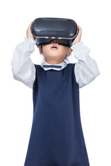 Asian little Chinese girl experiencing virtual reality via VR goggles