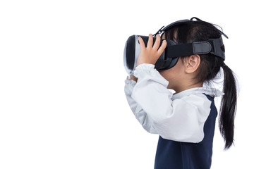 Asian little Chinese girl experiencing virtual reality via VR goggles