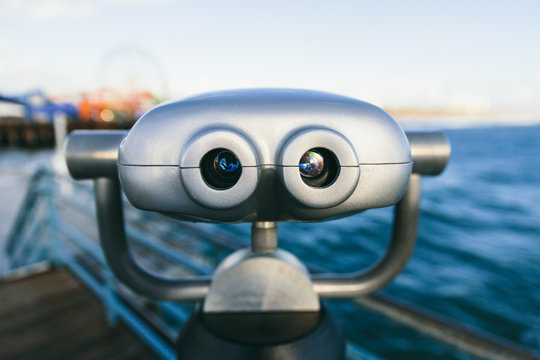 Binoculars on a pier
