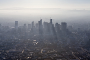Aerial view of thick summer smog in urban downtown Los Angeles, California.