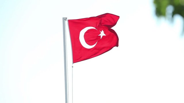 Turkish flag waving in blue sky, Flag of Turkey in the wind