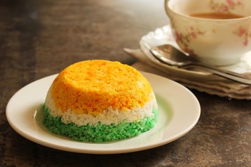 Tri color Indian Flag Food Steamed rice cake or Puttu  for Indipendence Day, selective focus