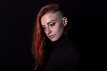 Naklejka premium red hair girl posing in studio