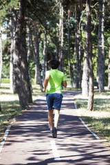 Young man running in the park