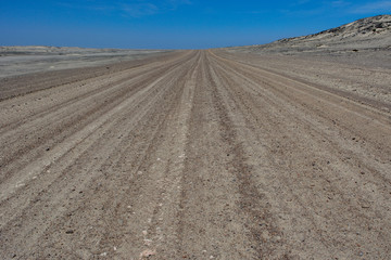 Fototapeta na wymiar Namibia skeleton coast gravel road