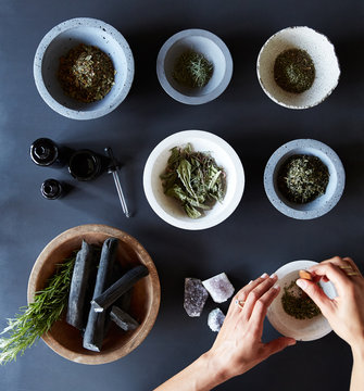 Woman making organic skincare products