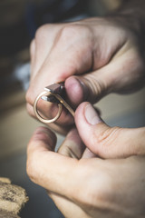 Hand-made wedding ring by goldsmith craftsman