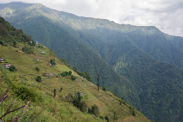Naklejka premium The hut and home on slope of hill, Annapurna mountain range