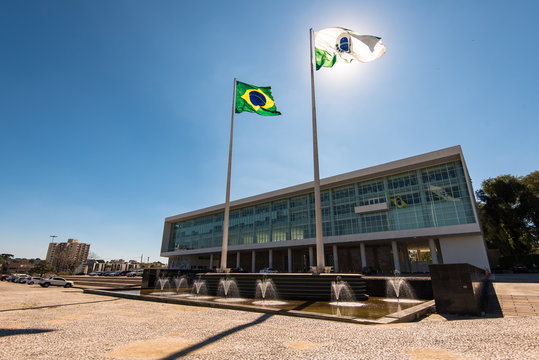 Government Building of Curitiba With Brazilian Flag Against the Sun