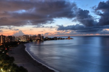 sunset in Puerto Rico with big clouds colorful sky and skyline 