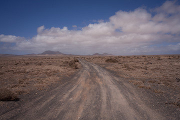 empty dirt road in the desert. Lanzarote