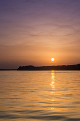 Beautiful abstract colorful sunset on the Danube river