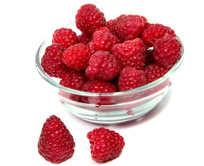ripe raspberries isolated on white background close up