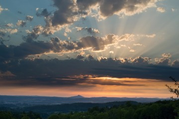 Sunset on sky and Bezdez from Kozakov, Czech republic.