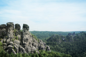 Fototapeta na wymiar Mountains of Bastei, rocks formation in Saxon Switzerland National Park, Kurort Rathen, Germany.
