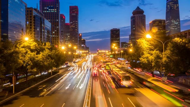 Time lapse of busy freeway traffic from day to night in beijing city，china  