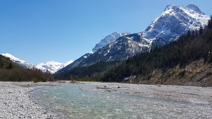Naklejka na ściany i meble Riverbed and mountains in Tyrol, Austria