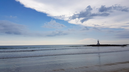 Fototapeta na wymiar Lighthouse on a Thai beach