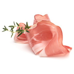Italian prosciutto crudo or jamon. Raw ham. Isolated on white background