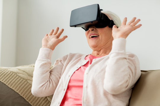 old woman in virtual reality headset or 3d glasses