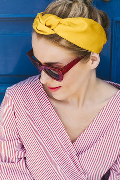 High angle view of woman in headband and sunglasses