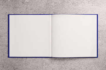 Blank white notepad on concrete surface