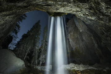Low angle view of waterfall at Hanging Lake during night